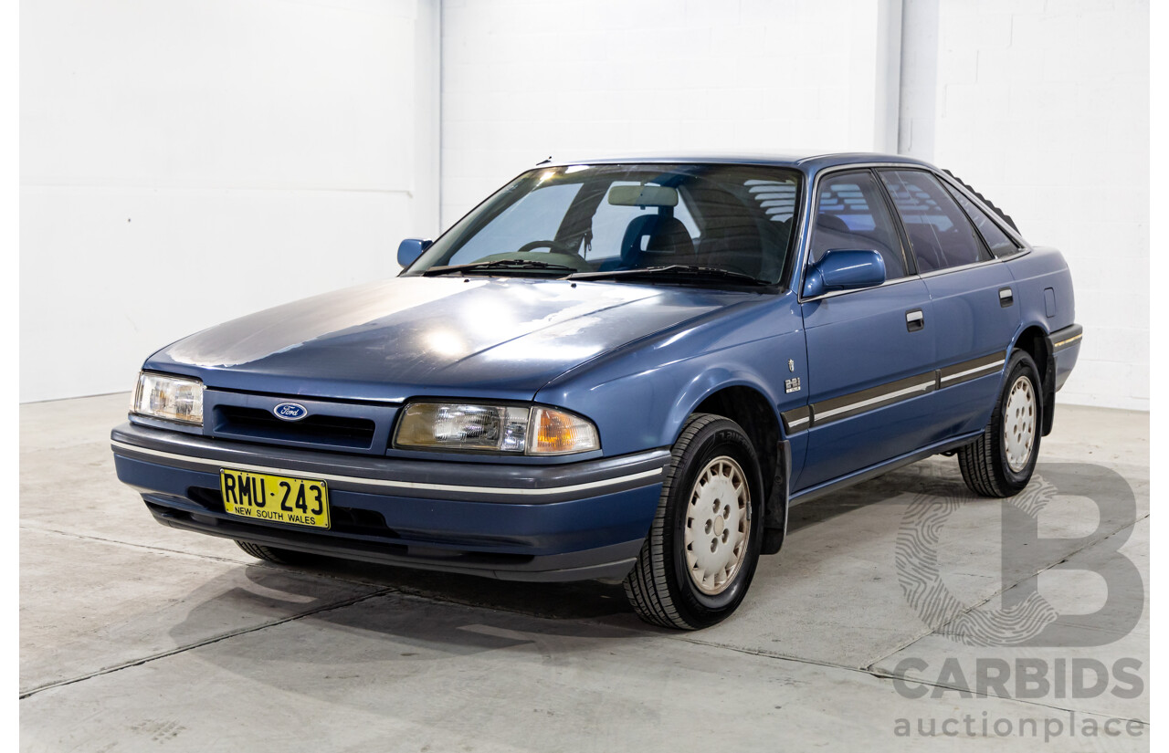 7/1990 Ford Telstar TX5 GHIA AV 5d Hatchback Jeans Blue 2.2L