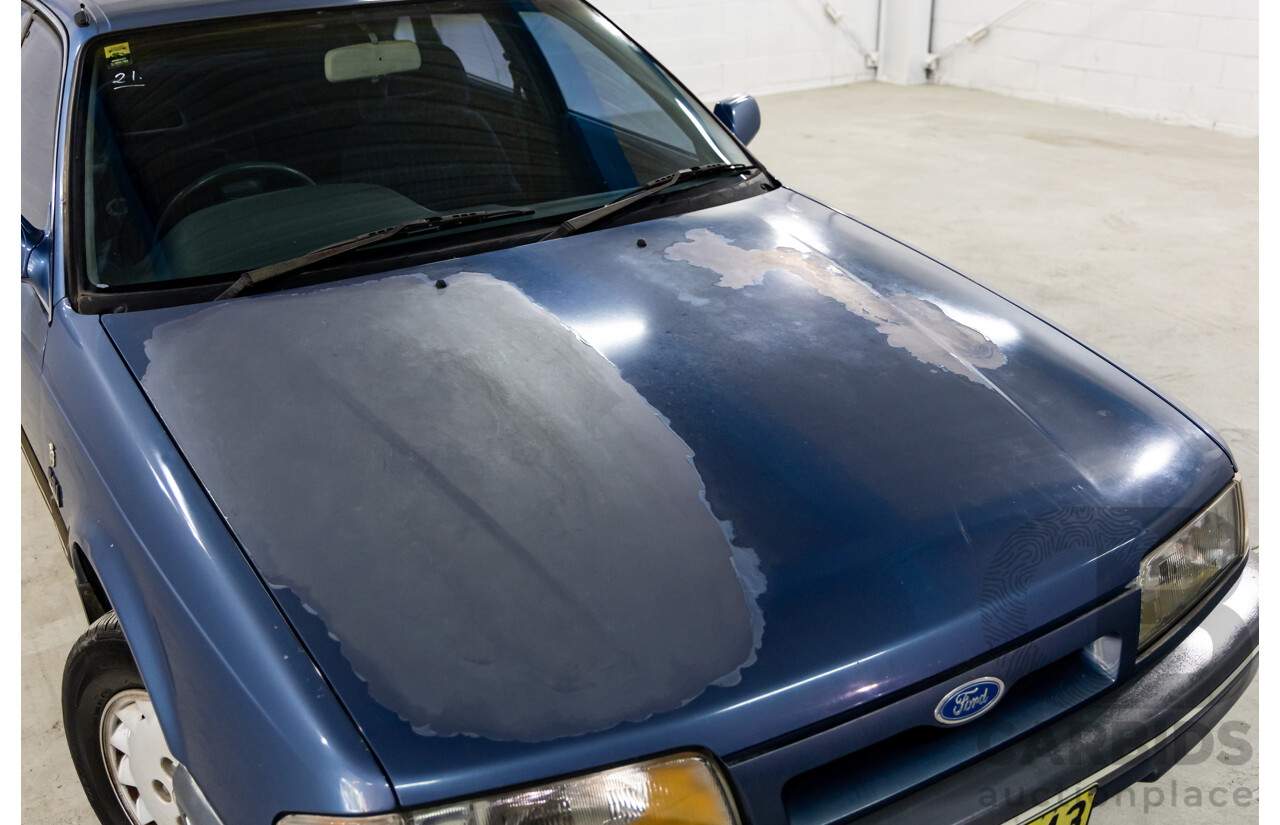 7/1990 Ford Telstar TX5 GHIA AV 5d Hatchback Jeans Blue 2.2L