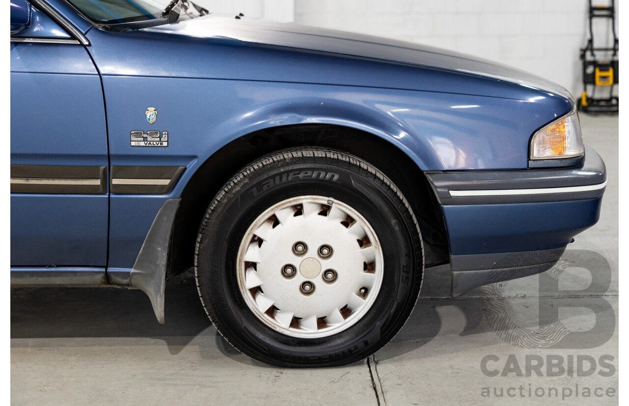 7/1990 Ford Telstar TX5 GHIA AV 5d Hatchback Jeans Blue 2.2L