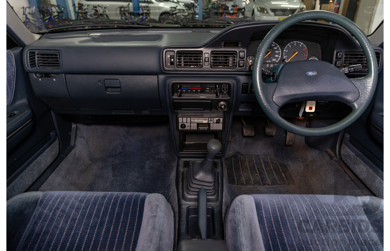 7/1990 Ford Telstar TX5 GHIA AV 5d Hatchback Jeans Blue 2.2L