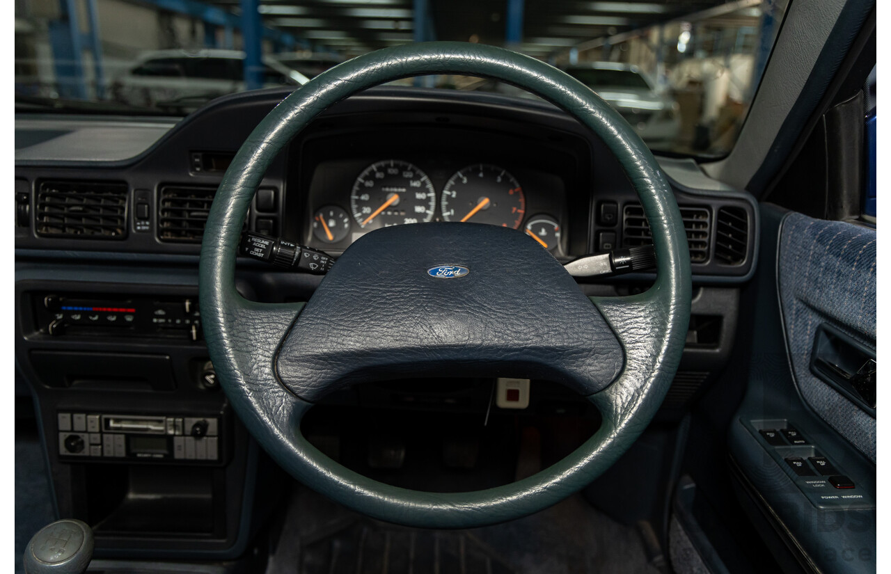 7/1990 Ford Telstar TX5 GHIA AV 5d Hatchback Jeans Blue 2.2L