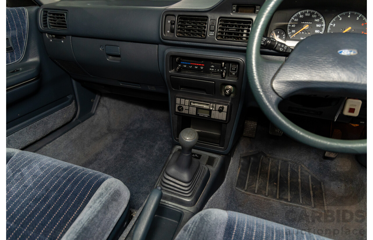 7/1990 Ford Telstar TX5 GHIA AV 5d Hatchback Jeans Blue 2.2L