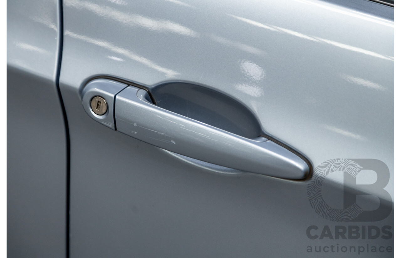 4/2009 BMW 320i Executive E90 MY09 4d Sedan Bluewater Metallic 2.0L