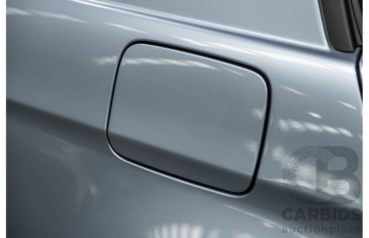 4/2009 BMW 320i Executive E90 MY09 4d Sedan Bluewater Metallic 2.0L