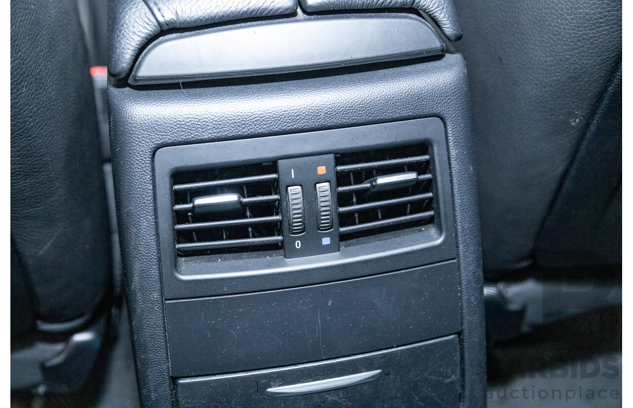 4/2009 BMW 320i Executive E90 MY09 4d Sedan Bluewater Metallic 2.0L