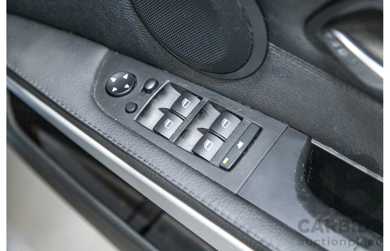 4/2009 BMW 320i Executive E90 MY09 4d Sedan Bluewater Metallic 2.0L