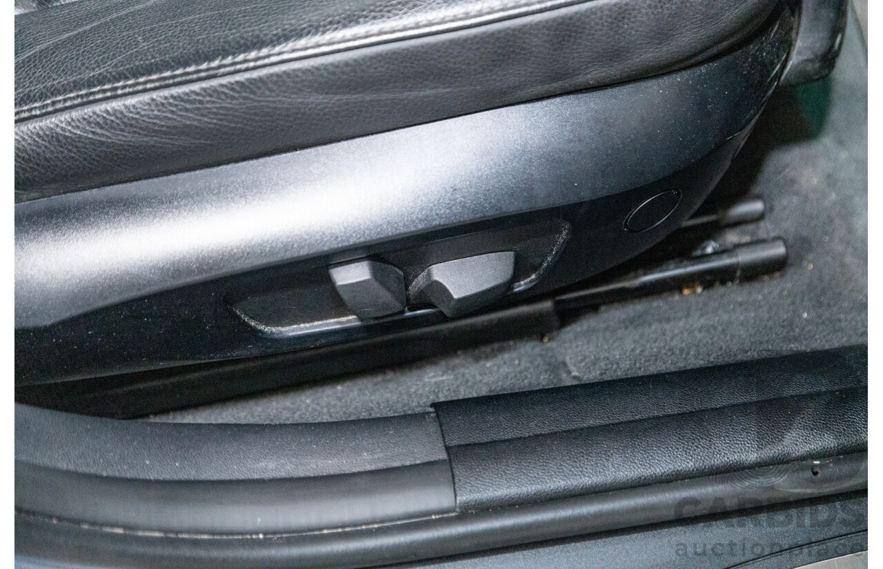 4/2009 BMW 320i Executive E90 MY09 4d Sedan Bluewater Metallic 2.0L