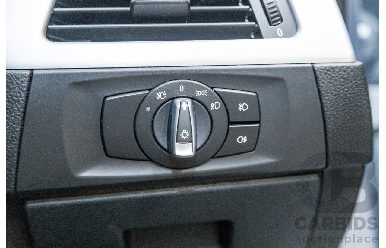 4/2009 BMW 320i Executive E90 MY09 4d Sedan Bluewater Metallic 2.0L