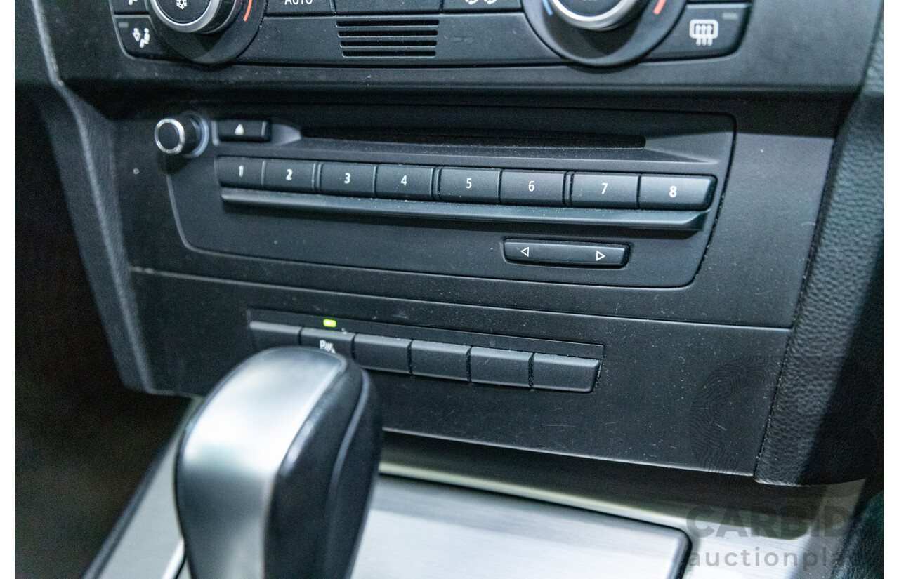 4/2009 BMW 320i Executive E90 MY09 4d Sedan Bluewater Metallic 2.0L