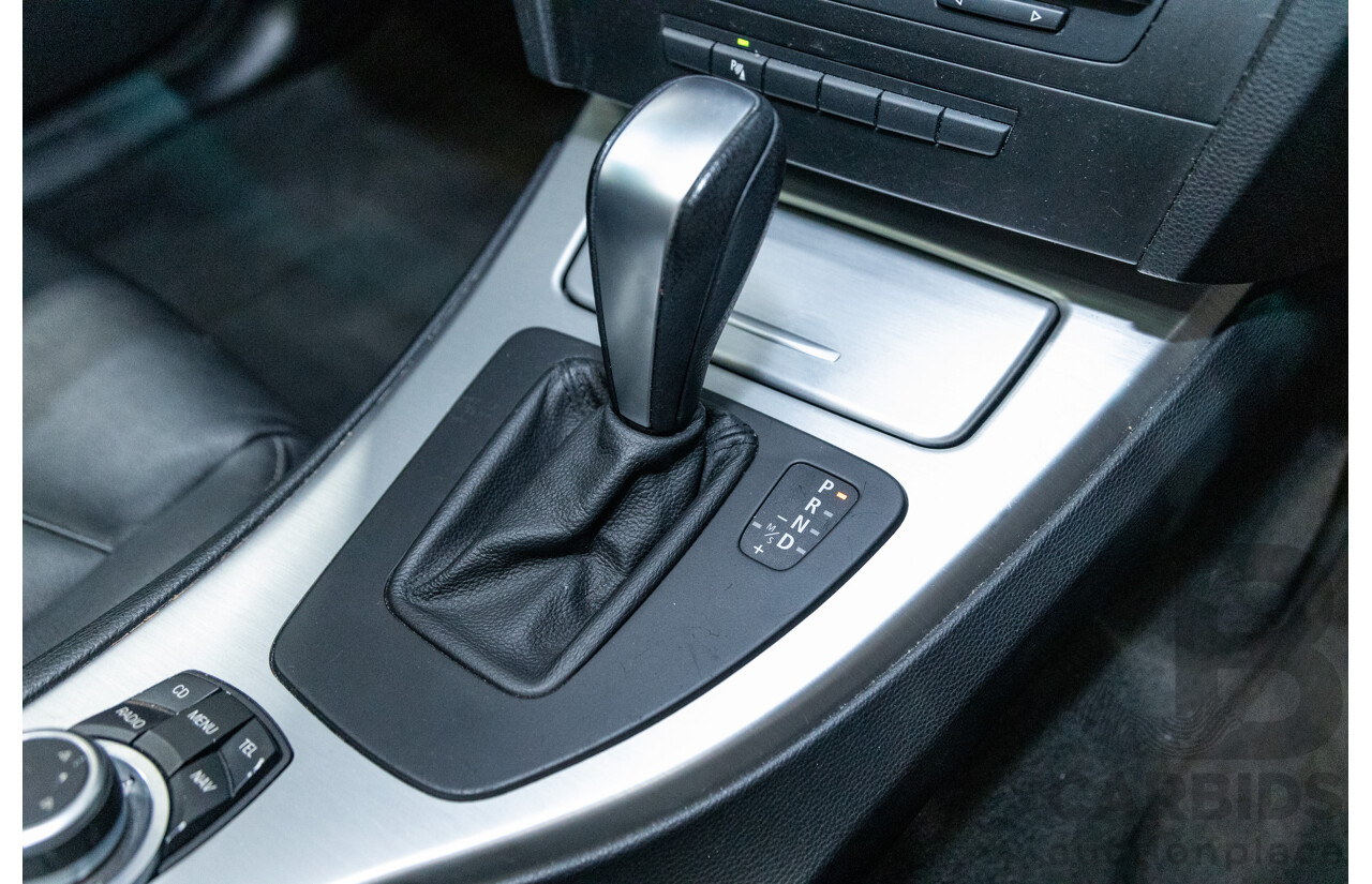 4/2009 BMW 320i Executive E90 MY09 4d Sedan Bluewater Metallic 2.0L