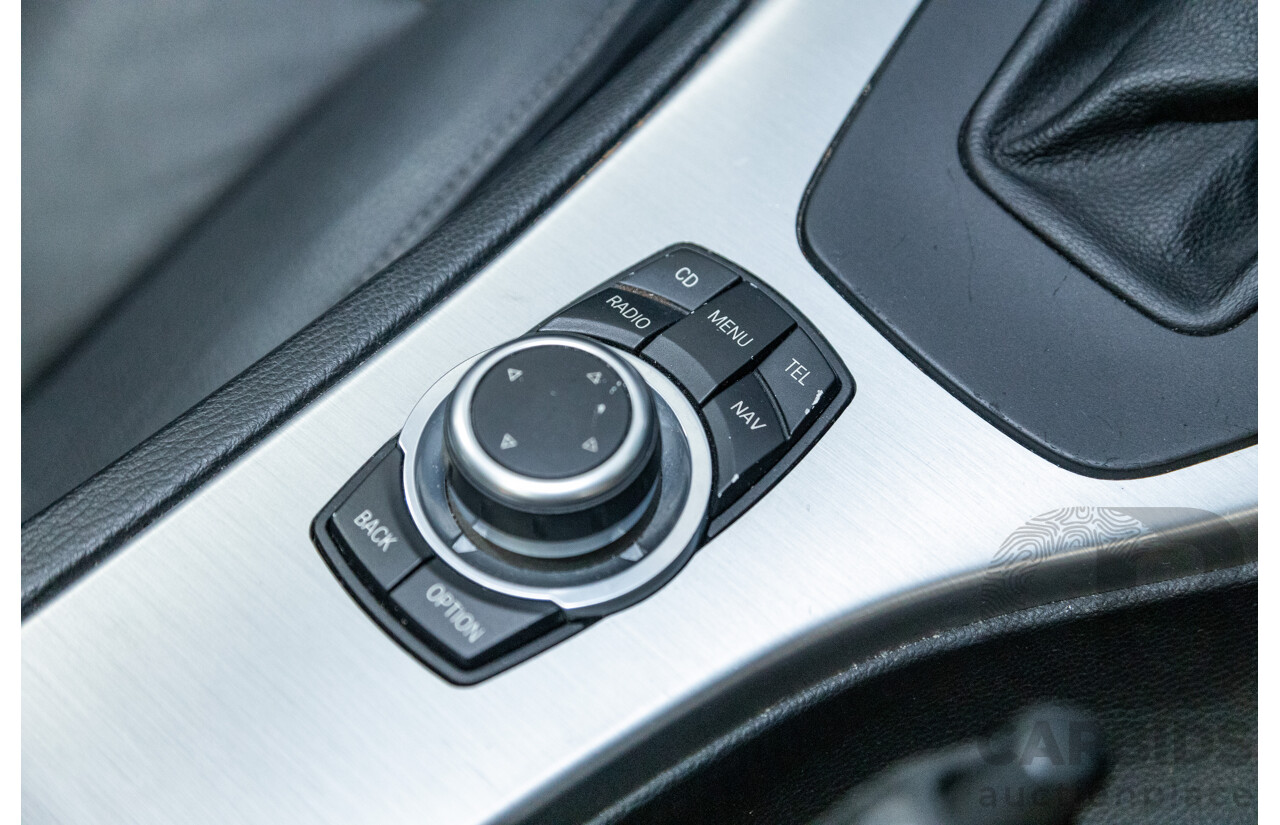 4/2009 BMW 320i Executive E90 MY09 4d Sedan Bluewater Metallic 2.0L