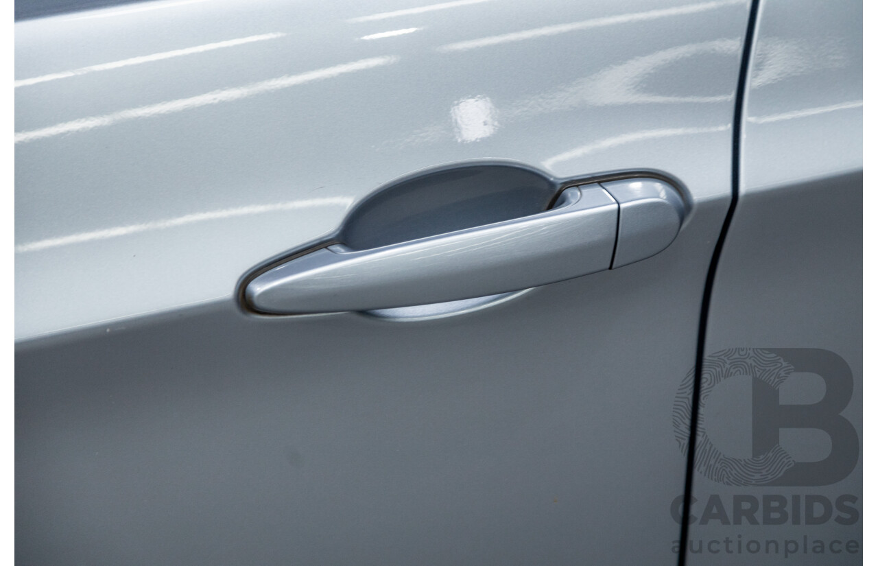 4/2009 BMW 320i Executive E90 MY09 4d Sedan Bluewater Metallic 2.0L