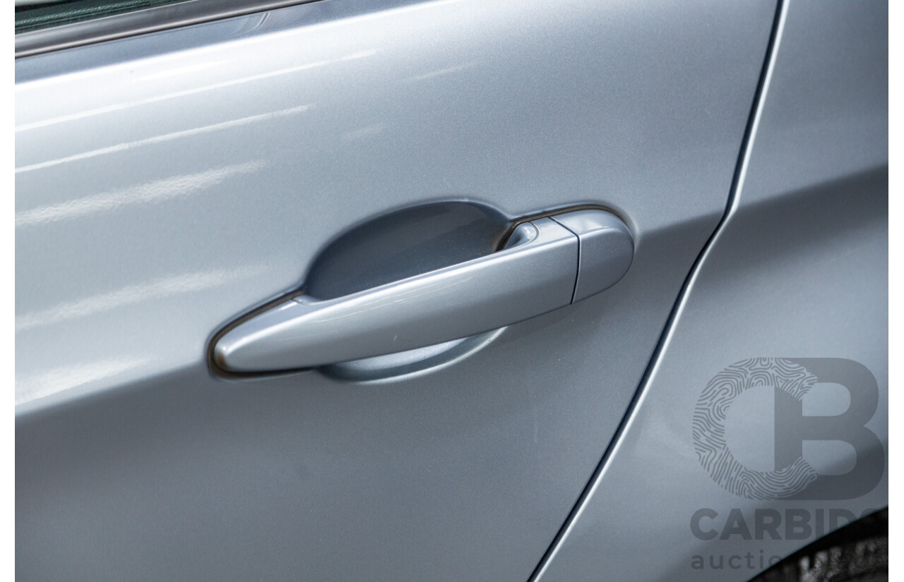 4/2009 BMW 320i Executive E90 MY09 4d Sedan Bluewater Metallic 2.0L