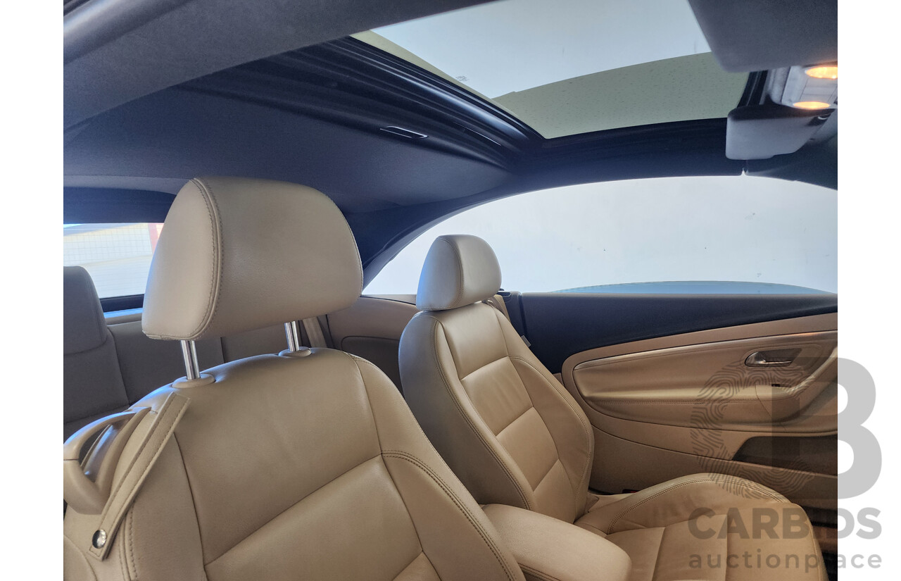 9/2009 Volkswagen EOS 147 TSI 1F MY09 UPGRADE 2d Convertible Blue 2.0L