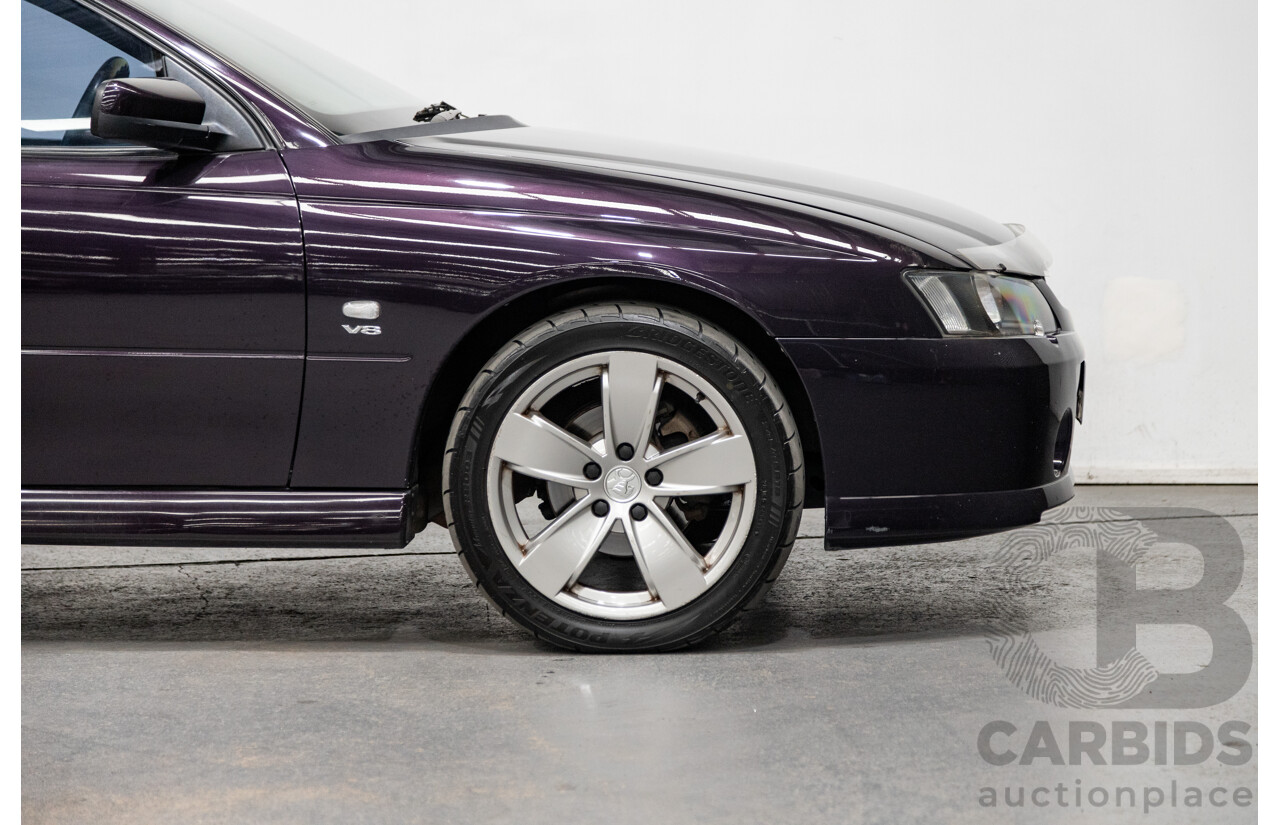 4/2004 Holden Crewman SS VYII Crew Cab Utility Cosmo Purple V8 5.7L