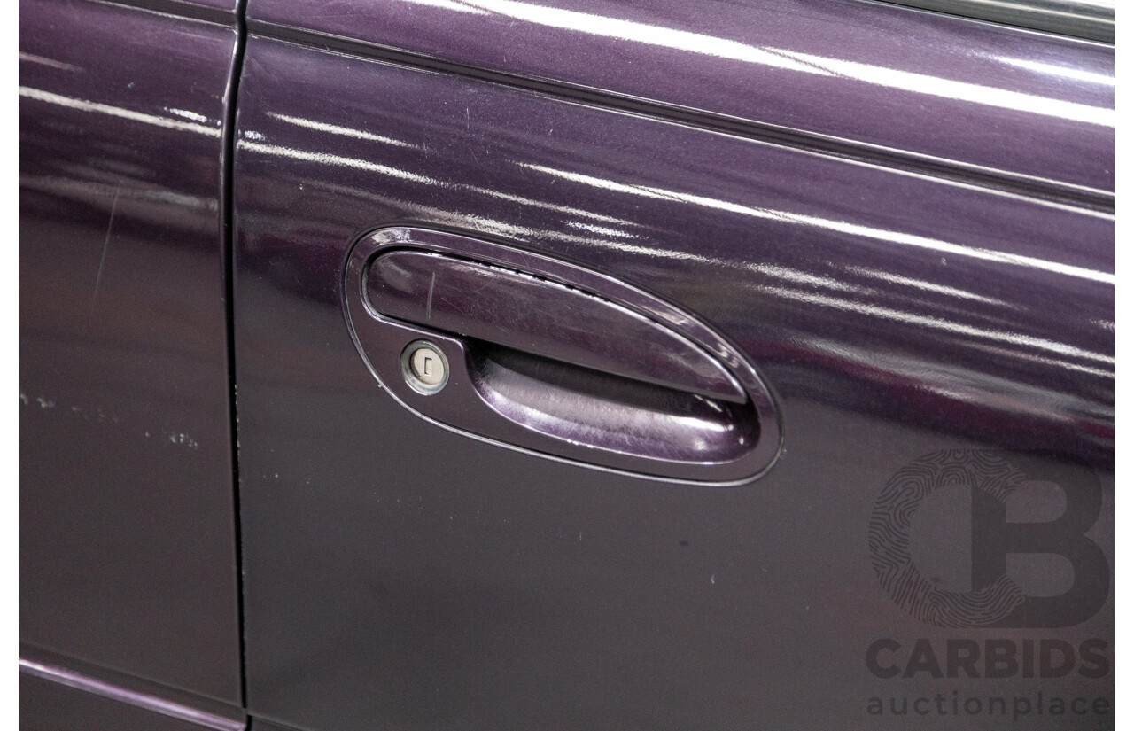 4/2004 Holden Crewman SS VYII Crew Cab Utility Cosmo Purple V8 5.7L