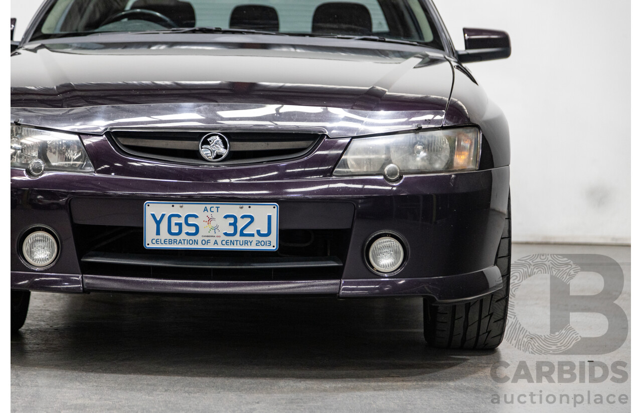 4/2004 Holden Crewman SS VYII Crew Cab Utility Cosmo Purple V8 5.7L