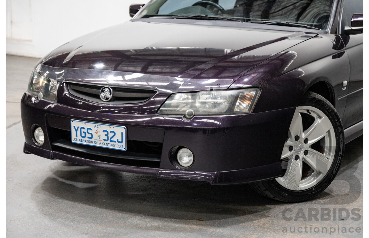 4/2004 Holden Crewman SS VYII Crew Cab Utility Cosmo Purple V8 5.7L