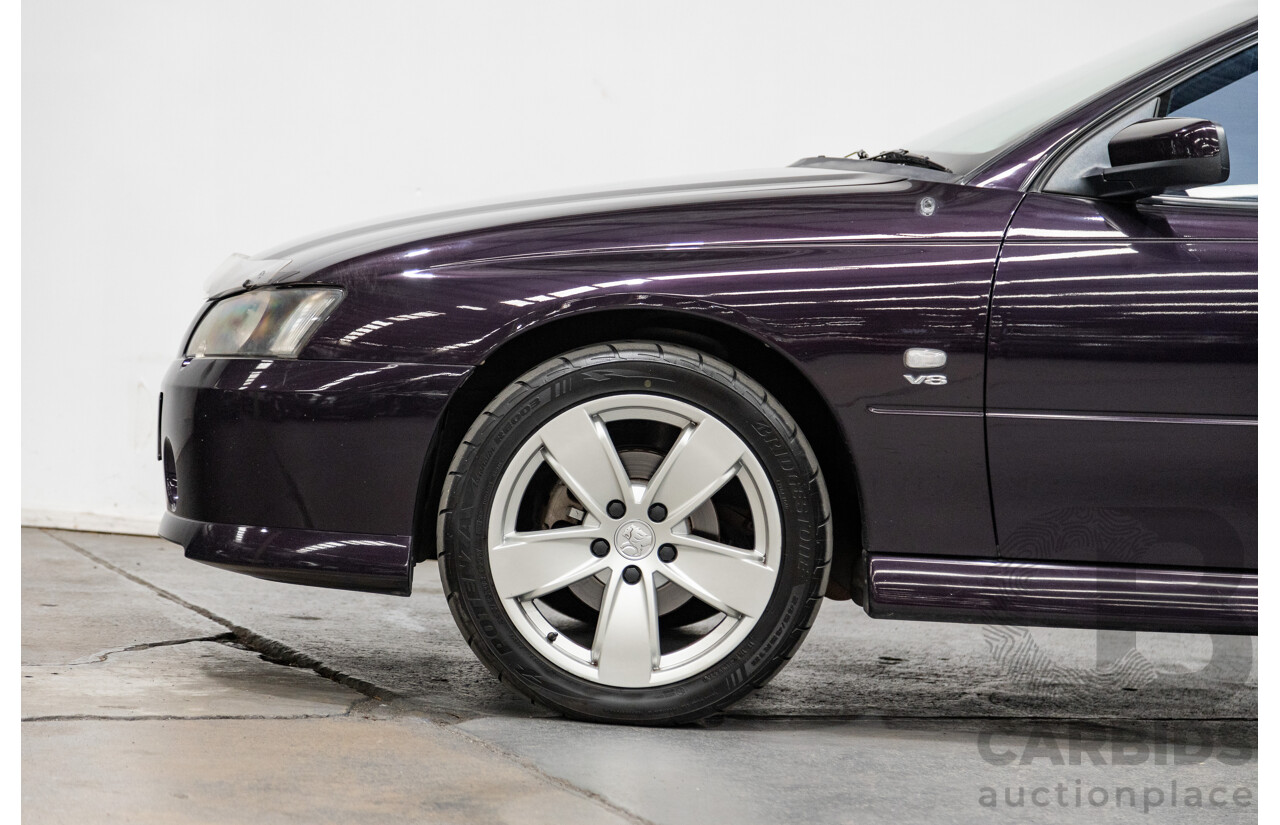 4/2004 Holden Crewman SS VYII Crew Cab Utility Cosmo Purple V8 5.7L