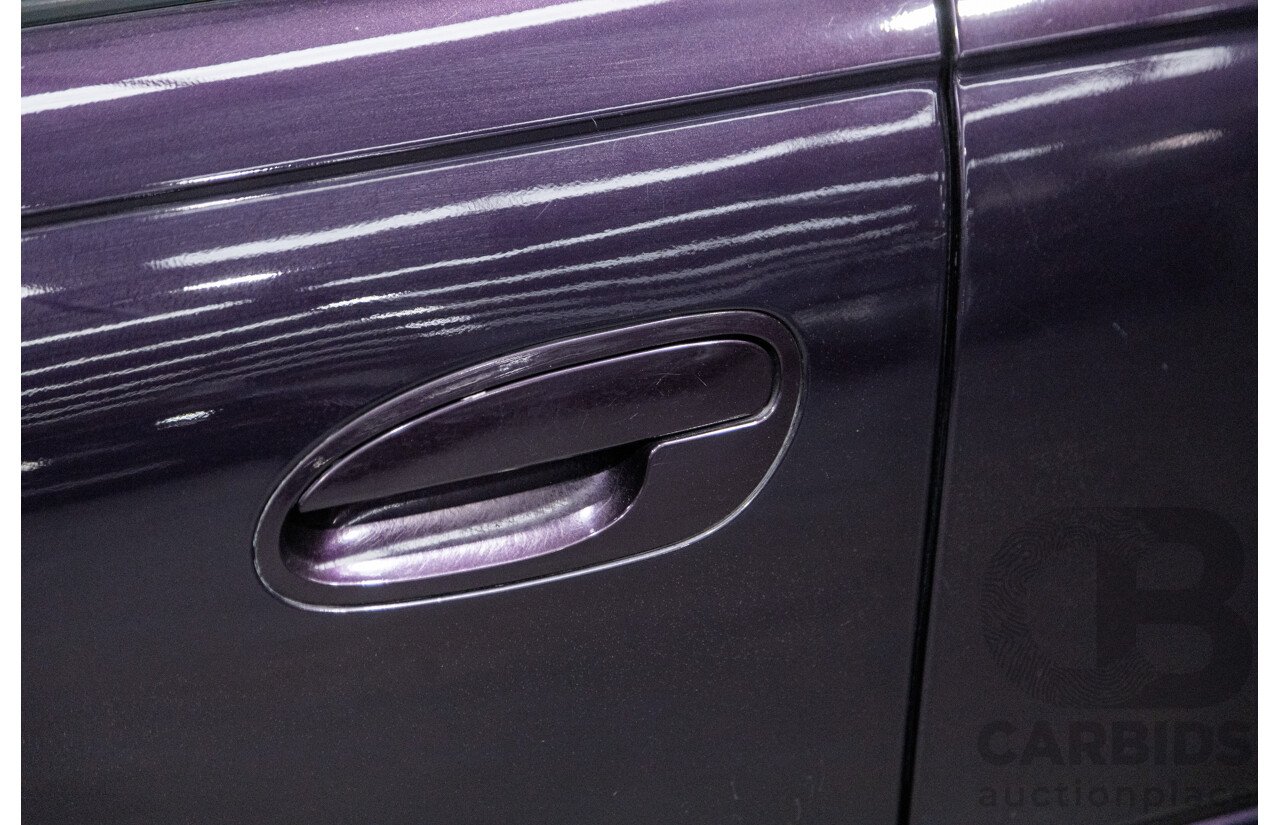 4/2004 Holden Crewman SS VYII Crew Cab Utility Cosmo Purple V8 5.7L