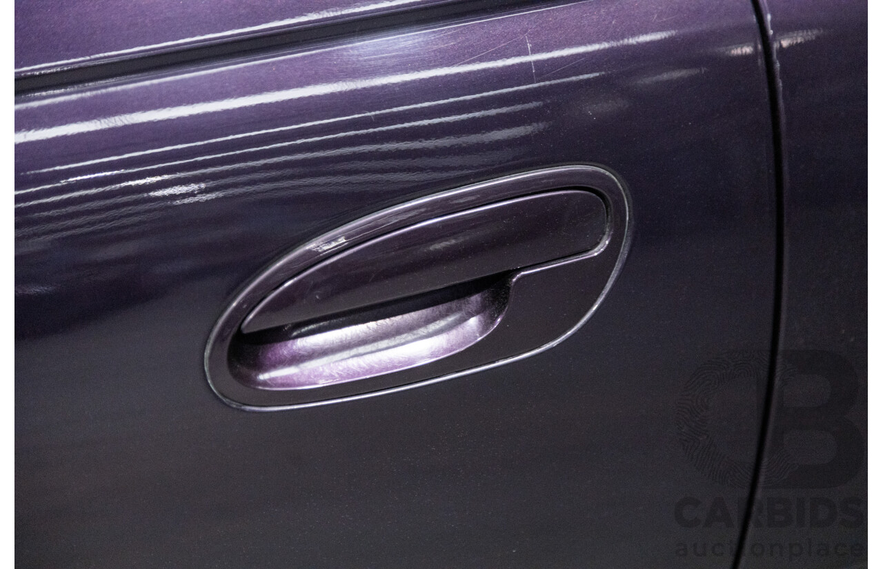 4/2004 Holden Crewman SS VYII Crew Cab Utility Cosmo Purple V8 5.7L