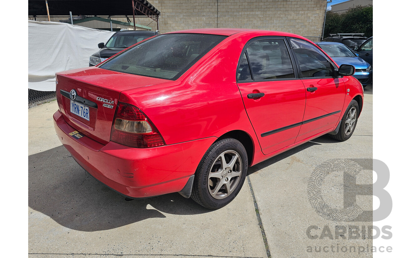 12/2003 Toyota Corolla Ascent ZZE122R 4d Sedan Red 1.8L