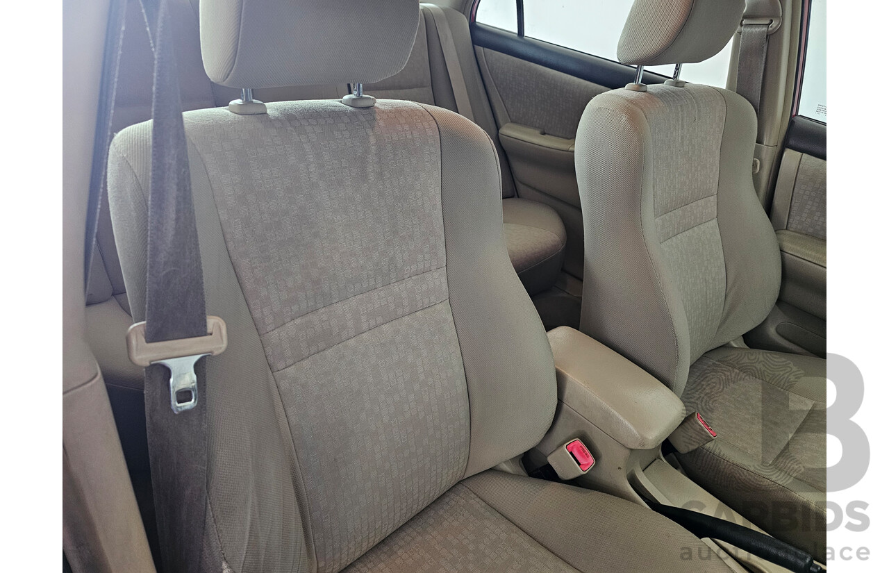 12/2003 Toyota Corolla Ascent ZZE122R 4d Sedan Red 1.8L