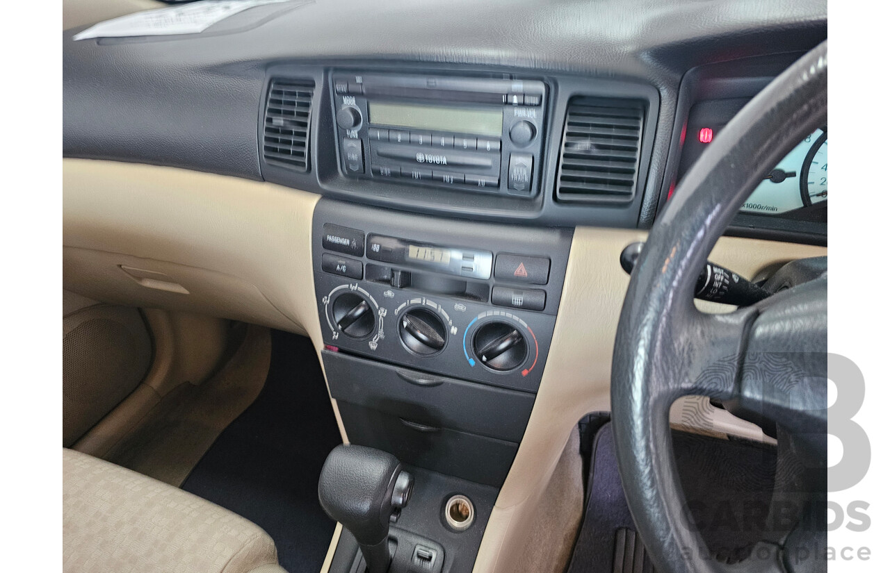 12/2003 Toyota Corolla Ascent ZZE122R 4d Sedan Red 1.8L