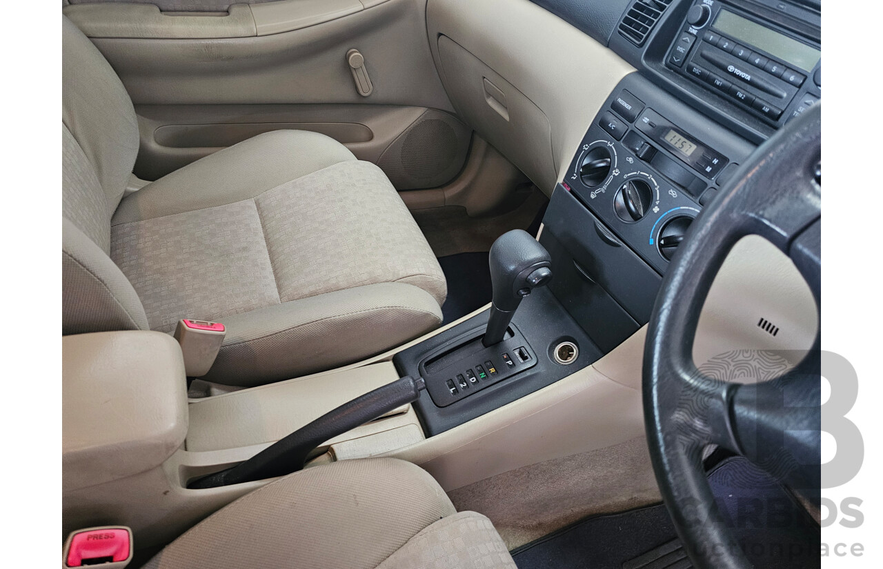 12/2003 Toyota Corolla Ascent ZZE122R 4d Sedan Red 1.8L