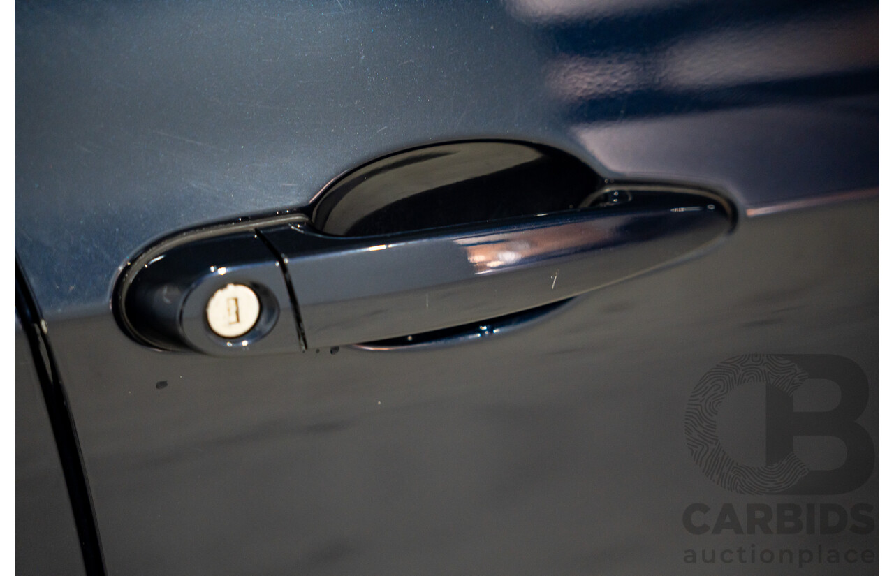 8/2009 BMW 320i Executive E90 MY09 4d Sedan Monaco Blue 2.0L