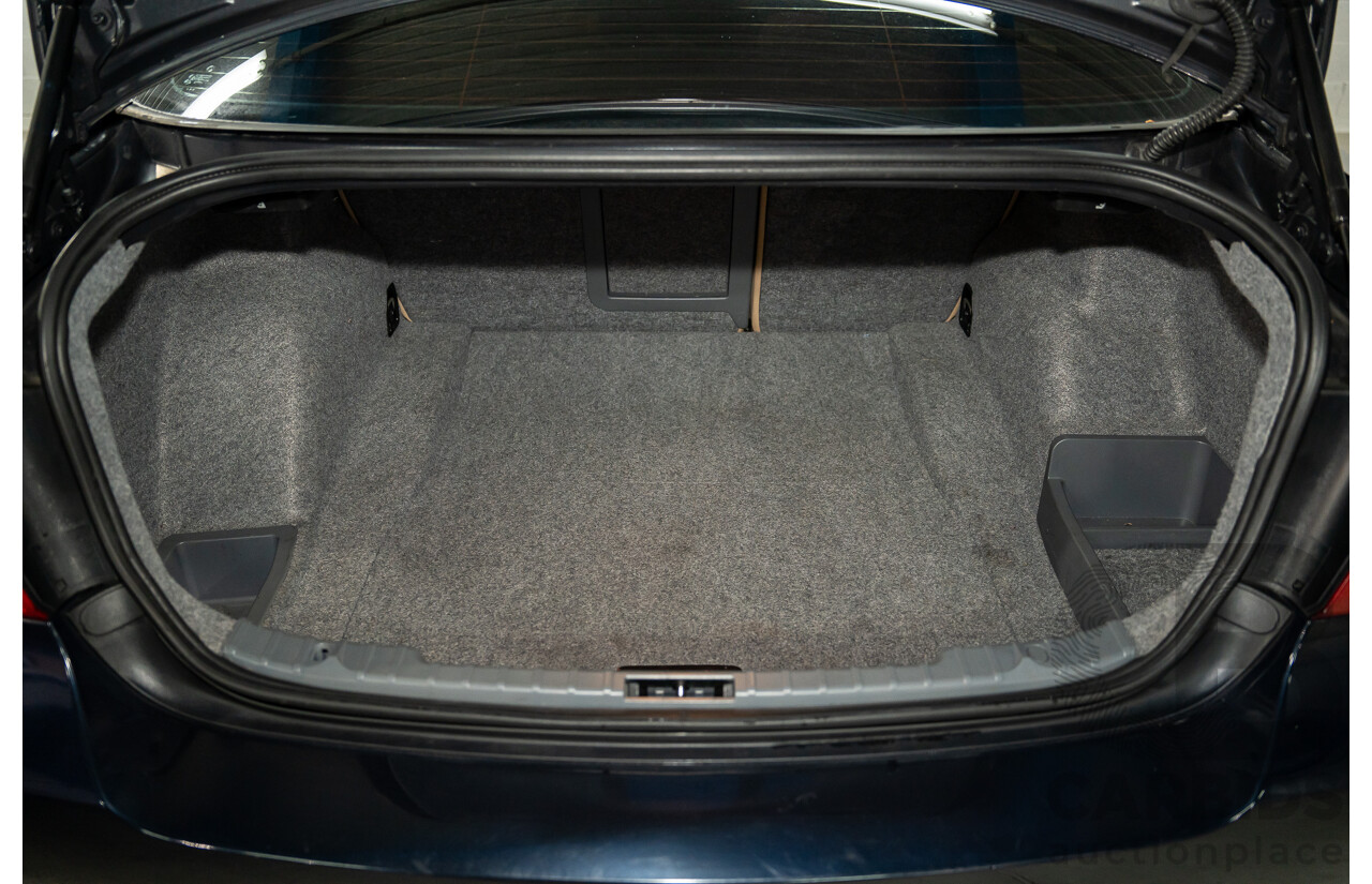 8/2009 BMW 320i Executive E90 MY09 4d Sedan Monaco Blue 2.0L