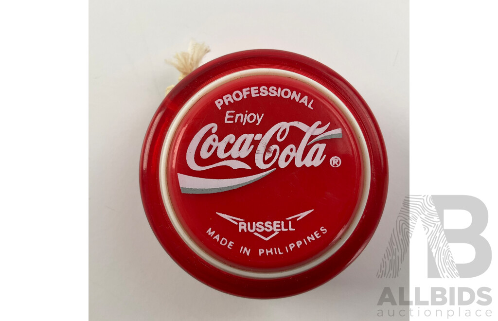 Two Russell Coca Cola Yo-yos Including Championship and Professional