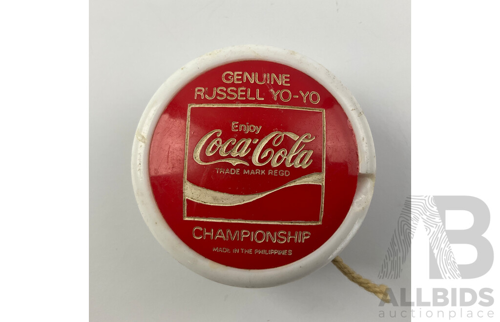 Two Russell Coca Cola Yo-yos Including Championship and Professional
