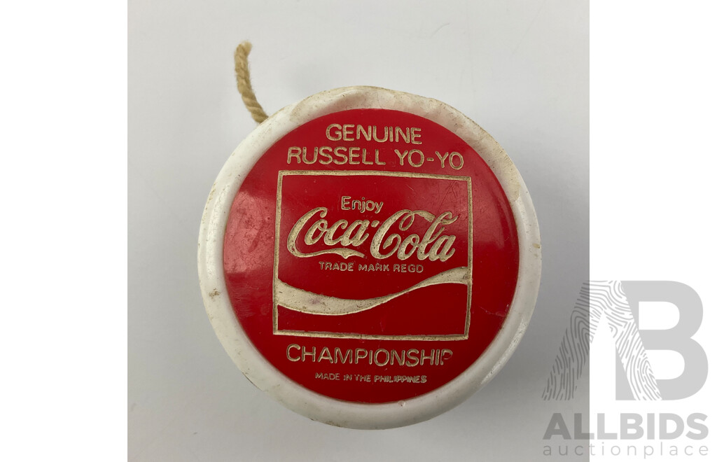 Two Russell Coca Cola Yo-yos Including Championship and Professional