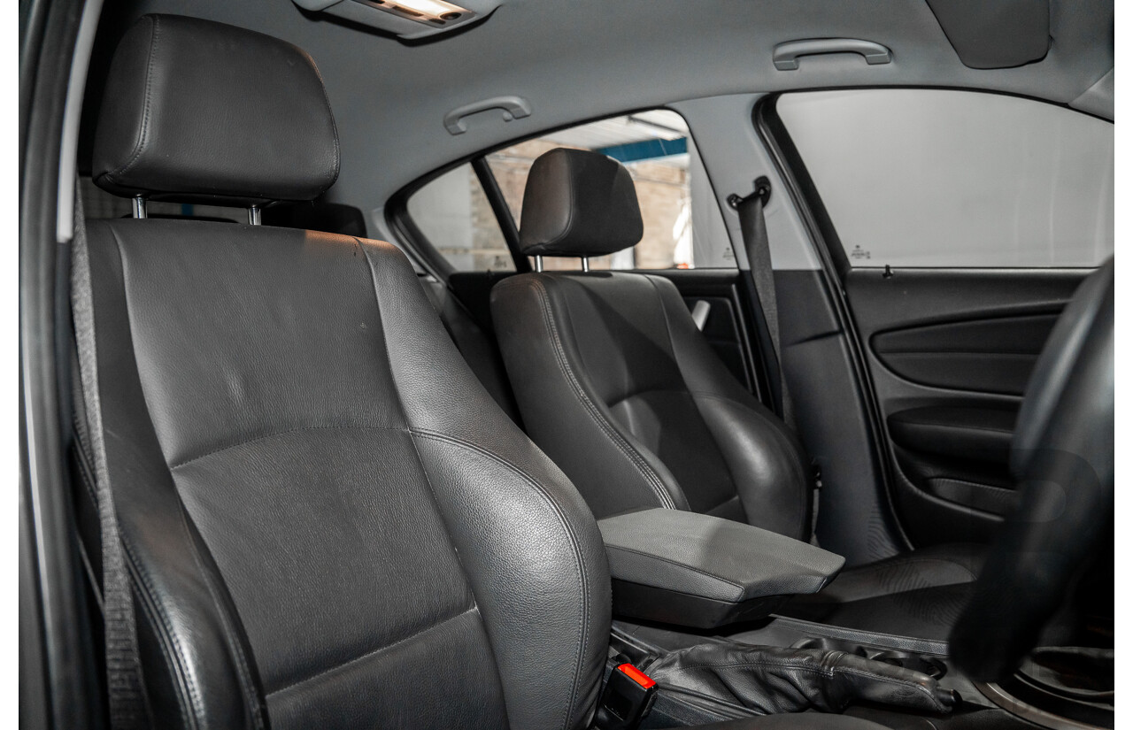 5/2009 BMW 120d E87 MY09 5d Hatchback Sapphire Black Metallic Turbo Diesel 2.0L