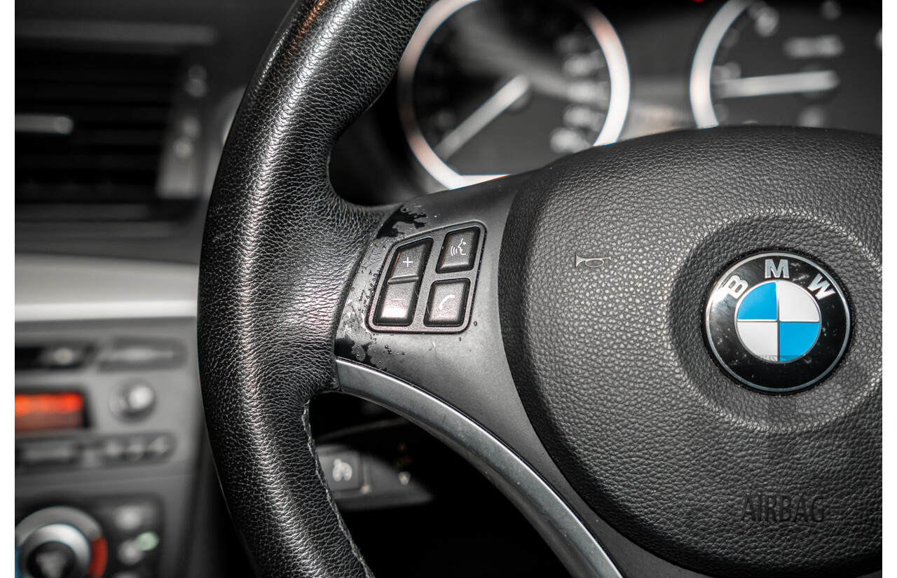 5/2009 BMW 120d E87 MY09 5d Hatchback Sapphire Black Metallic Turbo Diesel 2.0L