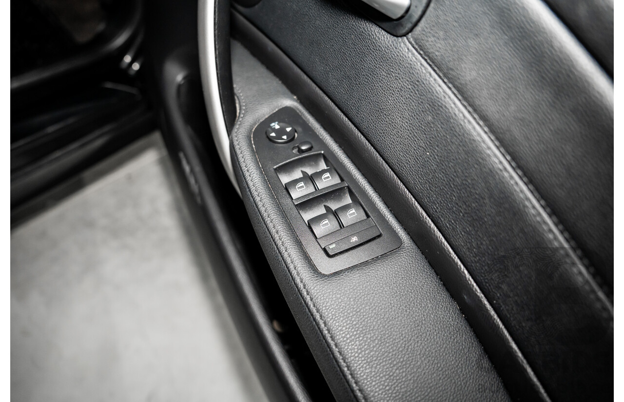 5/2009 BMW 120d E87 MY09 5d Hatchback Sapphire Black Metallic Turbo Diesel 2.0L