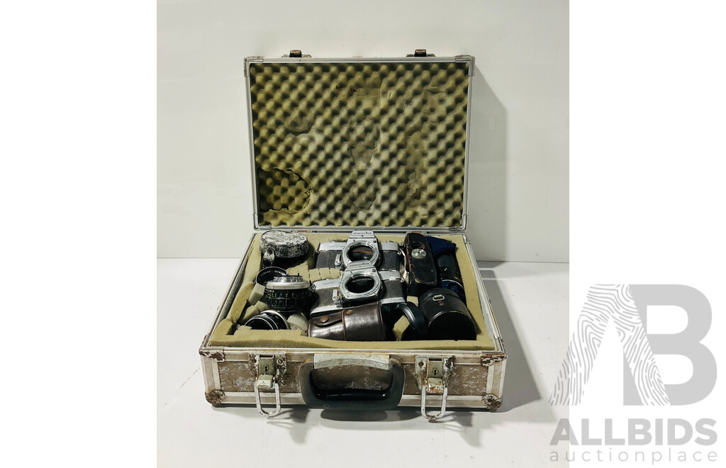 Pair of Vintage Minolta Cameras and Lenses in Weathered Case with Foam Insets