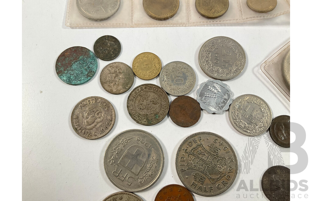 Assortment of International Coins Including Australian Silver 1947, 1953 Florins, 1952 Shilling, Thailand Coin Set, Great Britain 1965 Churchill Crown and More