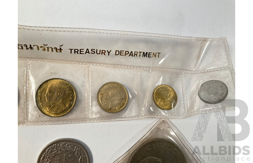 Assortment of International Coins Including Australian Silver 1947, 1953 Florins, 1952 Shilling, Thailand Coin Set, Great Britain 1965 Churchill Crown and More