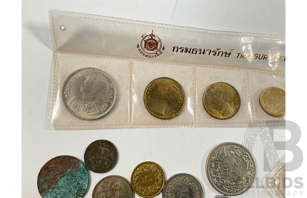 Assortment of International Coins Including Australian Silver 1947, 1953 Florins, 1952 Shilling, Thailand Coin Set, Great Britain 1965 Churchill Crown and More