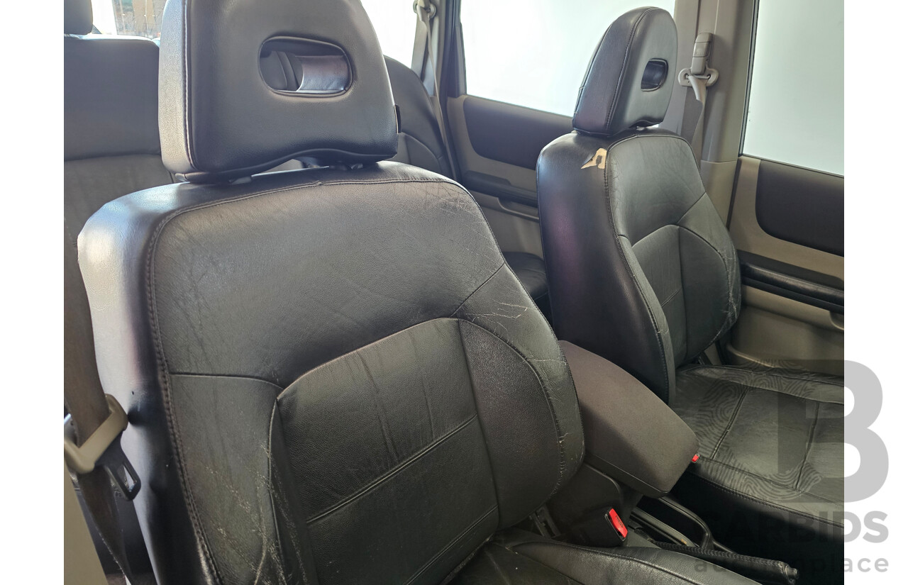 6/2004 Nissan X-Trail Ti-L (sunroof) (4x4) T30 4d Wagon Black 2.5L