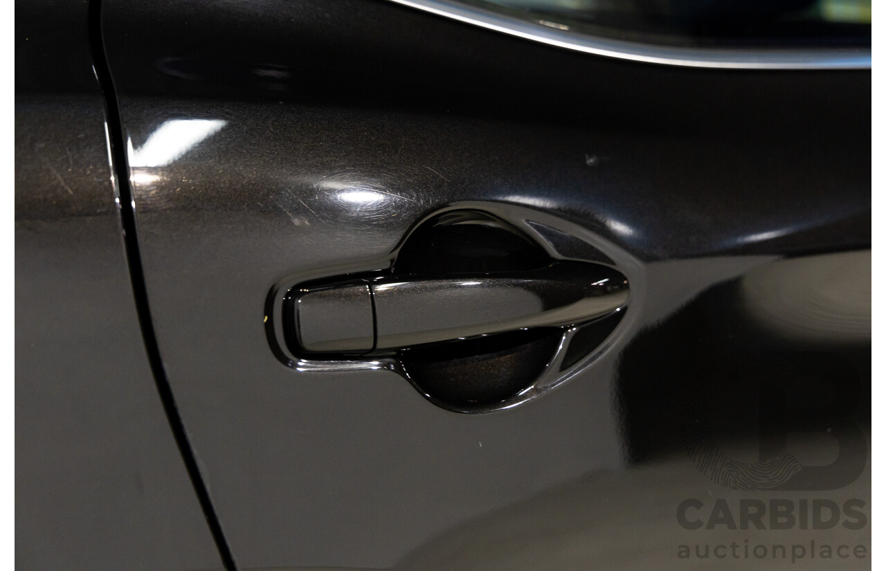 10/2016 Nissan Qashqai ST (FWD) J11 4d Wagon Pearl Black Metallic 2.0L