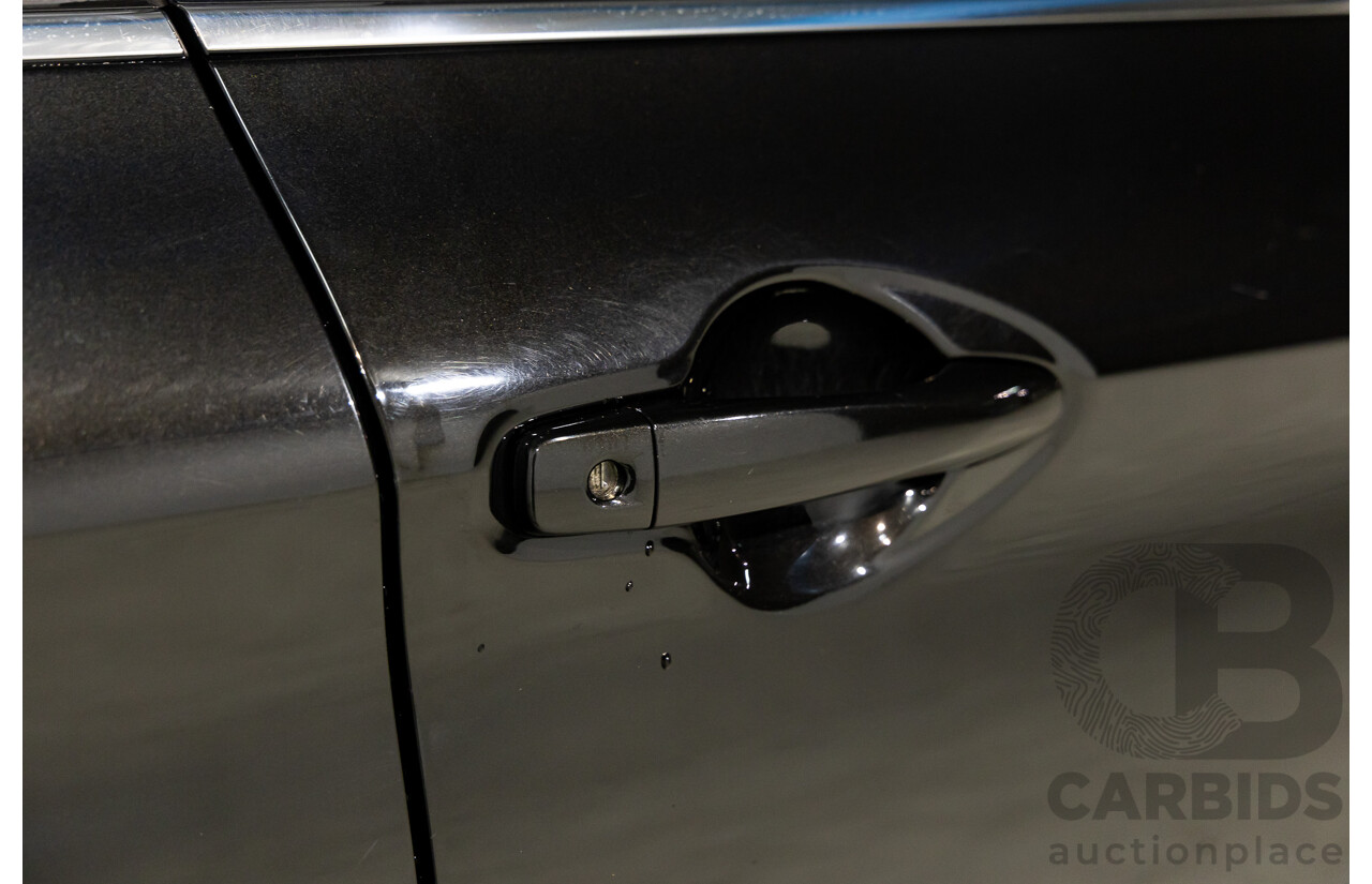 10/2016 Nissan Qashqai ST (FWD) J11 4d Wagon Pearl Black Metallic 2.0L