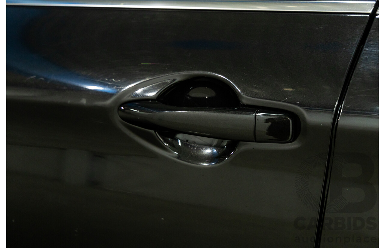 10/2016 Nissan Qashqai ST (FWD) J11 4d Wagon Pearl Black Metallic 2.0L