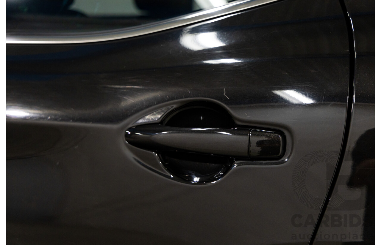 10/2016 Nissan Qashqai ST (FWD) J11 4d Wagon Pearl Black Metallic 2.0L