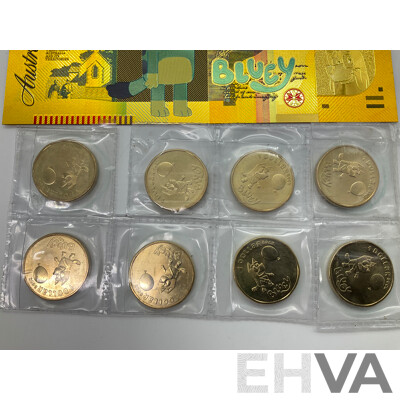 Eight Australian 2024 Commemorative One Dollar Coins, Bluey Bucks, Three Novelty Fifty Dollar Bluey Notes and Japanese WW2 One Gulden Note