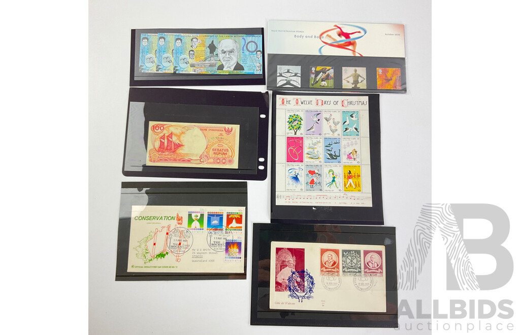 Christmas Island 1977 Christmas Stamp Sheet, Vatican City 1969 First Day Cover, UK 2000 Body and Bone Stamps, Indonesia One Hundred Rupiah Note, Four Australian Nothing Notes