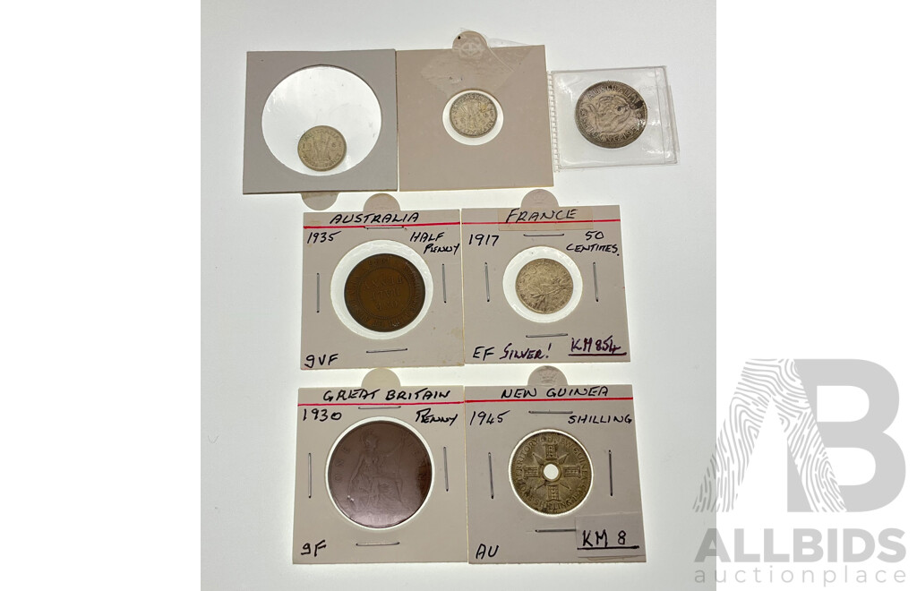Two Australian 1961 Silver Threepence, 1954 Shilling, 1935 Penny, New Guinea 1945 Shilling, France 1917 Fifty Centimes, UK 1930 Penny