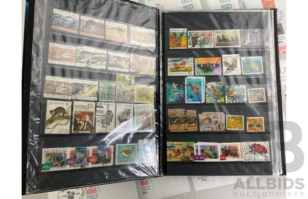 Collection of International Stamps Including Ten Australian 1984 AUSIPEX Covers, Maldives 1970's Mint Stamps, Two Stamp Albums of Cancelled Stamps, Empty Australian Stamp Albums 1981, 1985, 1987